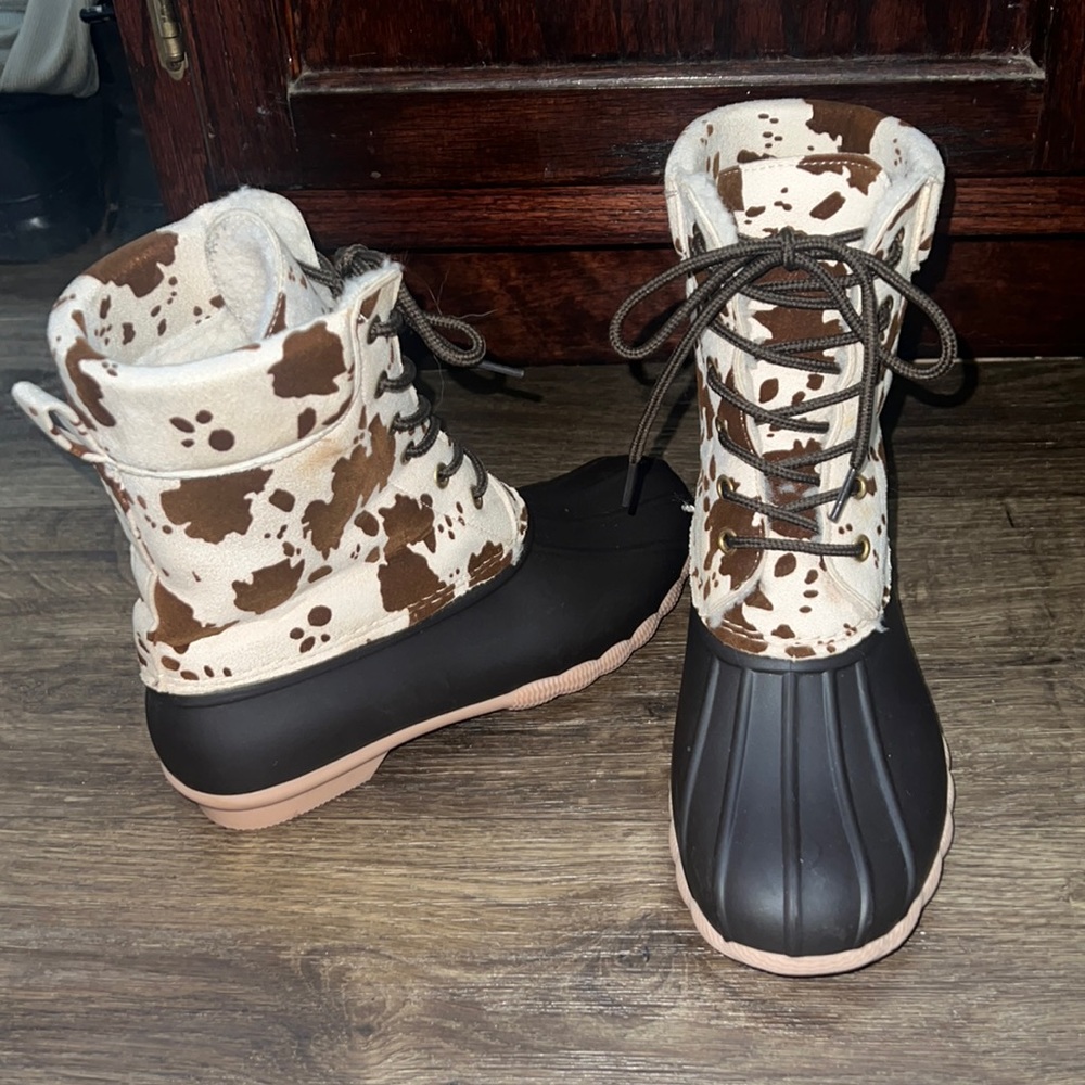 Cow print duck boots